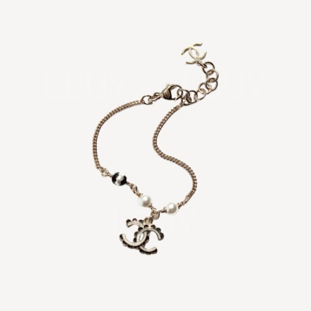 CHANEL Gold Bracelet with Pearl and Black Accents - Picture 3 of 10